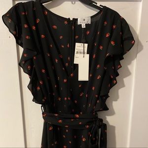 Black mid length dress with strawberry print.